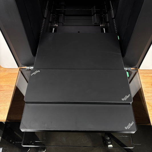 Samcraft FatMat kit for the xTool Omni UV printer, both the standard bed mat and the mini bed mat shown fitted on the print bed