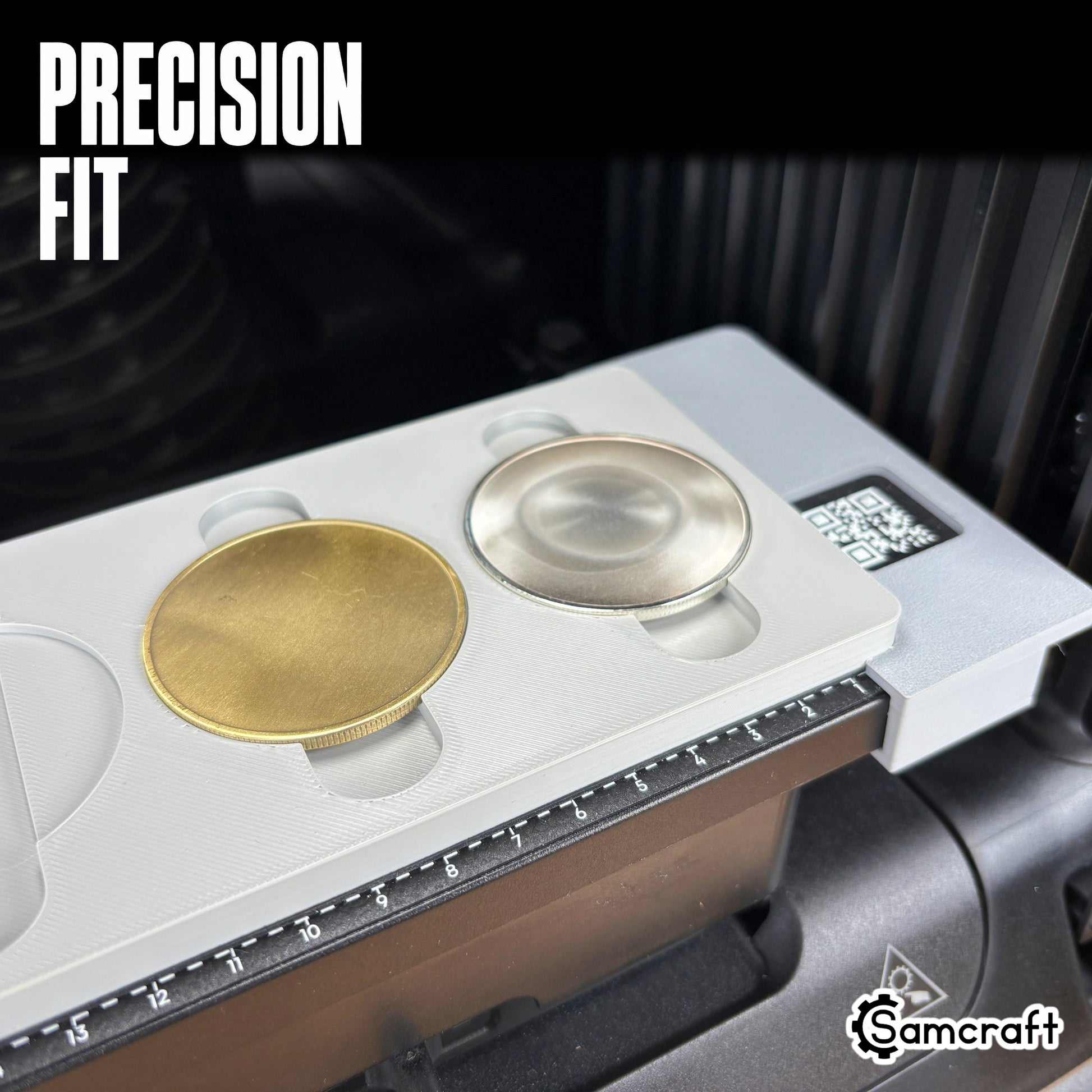 Precision-fit Samcraft Metal Coin Jig holding gold and silver metal coin blanks snugly in the gray tray's recessed cradles on the eufyMake E1.