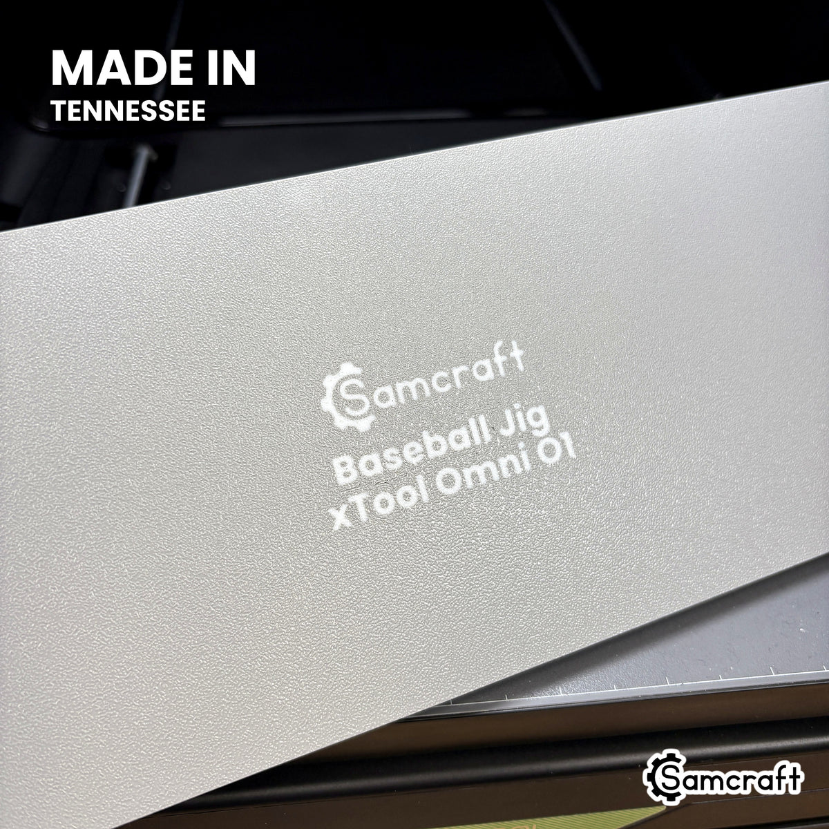 Underside of the Samcraft baseball jig showing the molded Samcraft branding and xTool Omni O1 lettering, made in Tennessee.