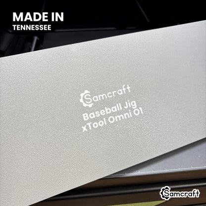 Underside of the Samcraft baseball jig showing the molded Samcraft branding and xTool Omni O1 lettering, made in Tennessee.