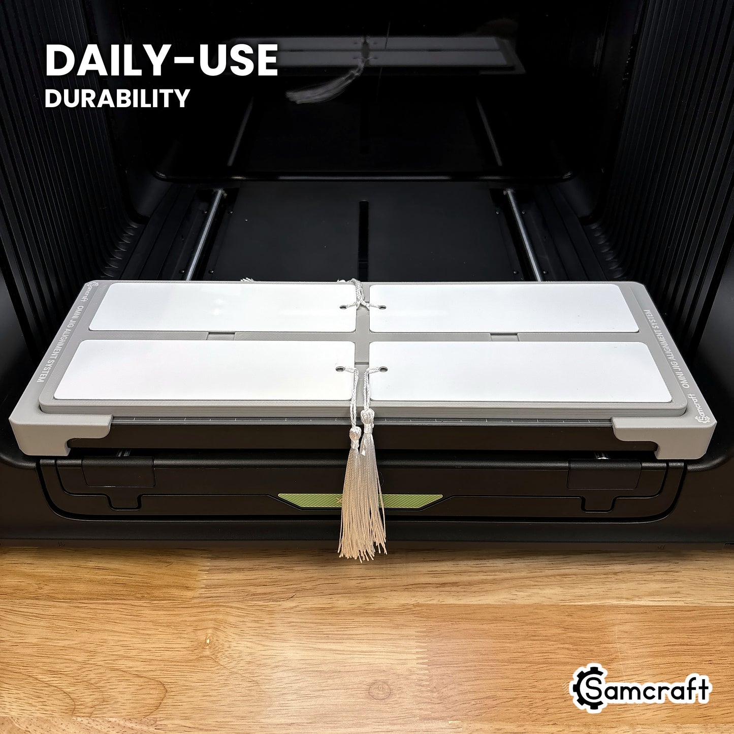 Samcraft xTool Omni 2x6 bookmark jig held in hand, showing the durable one-piece construction built for daily use.