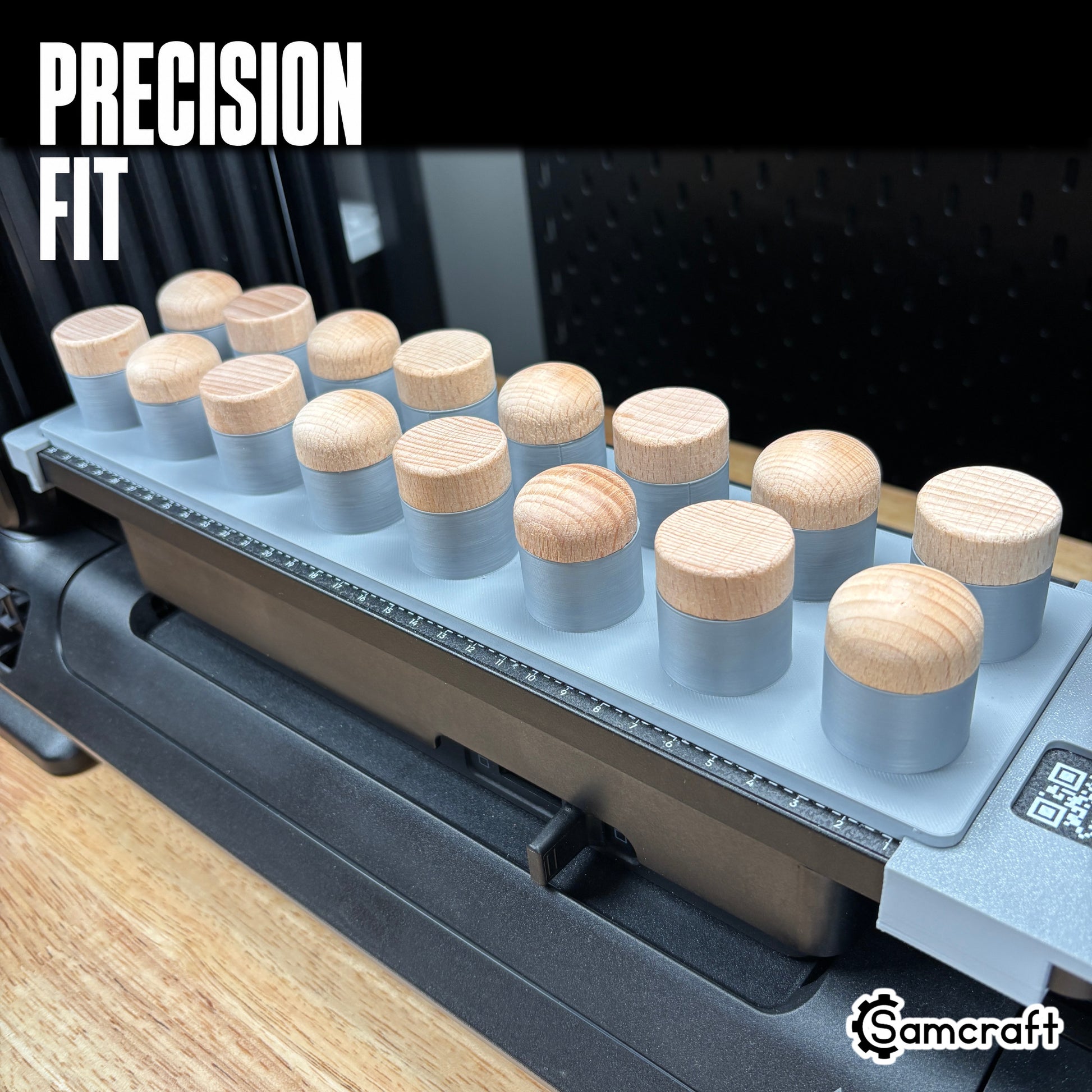 Precision-fit Samcraft Bottle Stopper Jig holding wood-topped bottle stoppers snugly in gray cylindrical recesses on the eufyMake E1 UV printer.