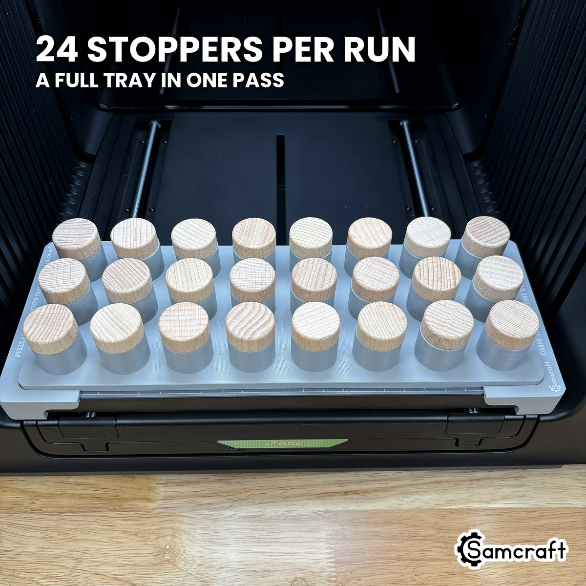 Samcraft bottle stopper jig for the xTool Omni loaded with twenty-four stoppers in three staggered rows of eight.