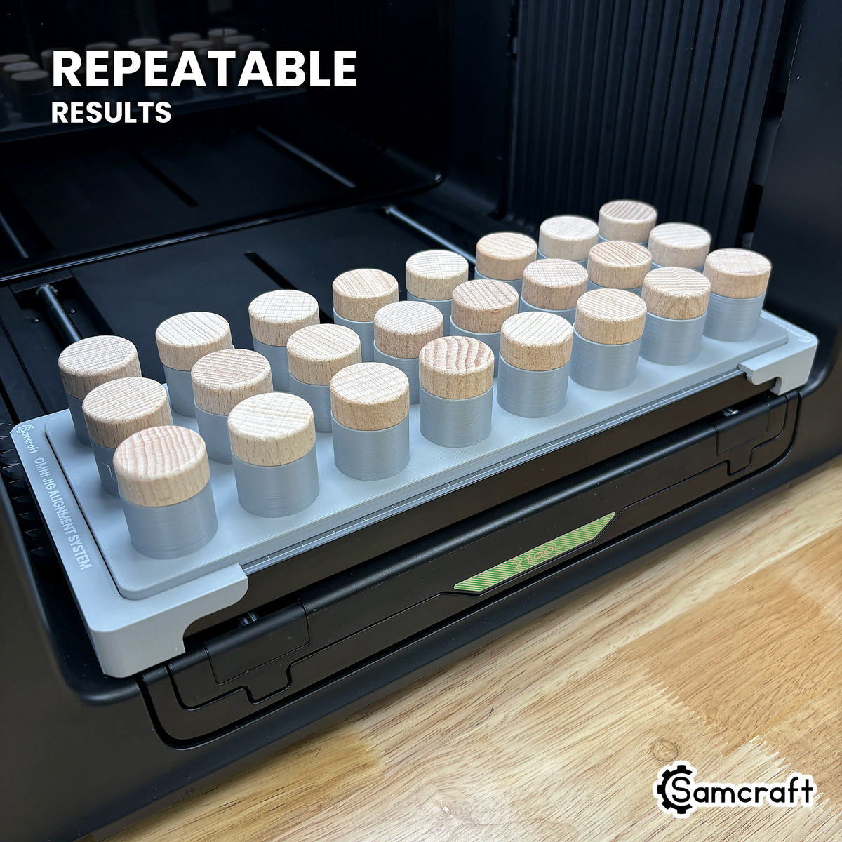 Angled view of the Samcraft bottle stopper jig on the xTool Omni printer bed, loaded with twenty-four stoppers for repeatable results.