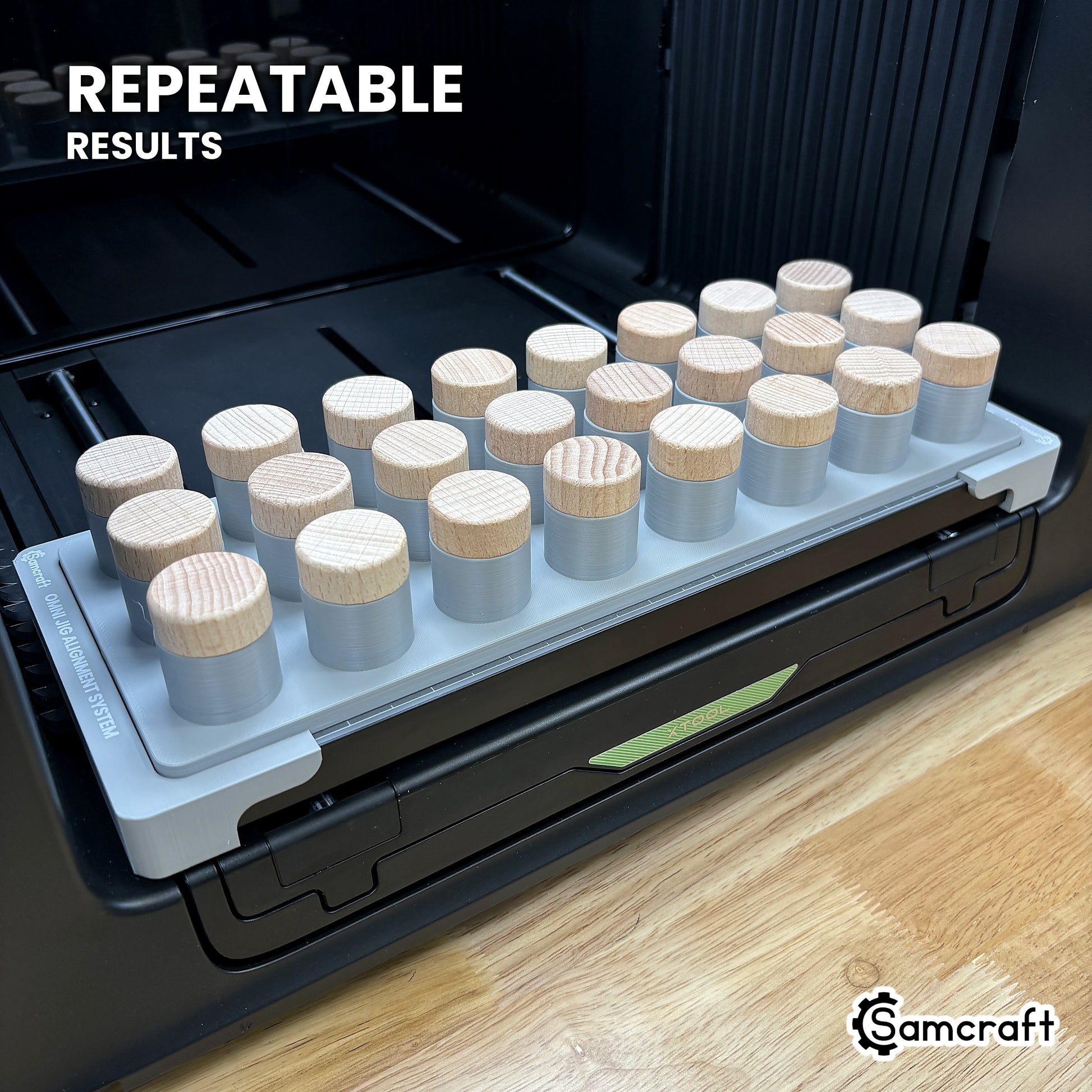 Angled view of the Samcraft bottle stopper jig on the xTool Omni printer bed, loaded with twenty-four stoppers for repeatable results.