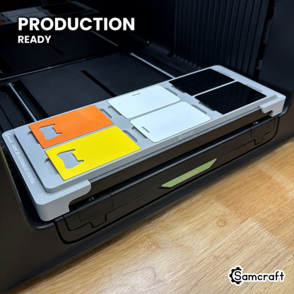 Samcraft card jig loaded with six blanks on the xTool Omni UV printer bed, set up for production runs.