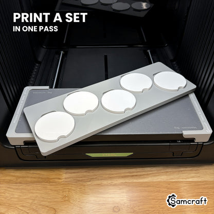 Samcraft xTool Omni car coaster jig filled with five coasters, enough to print two matched pairs and a spare in one pass.