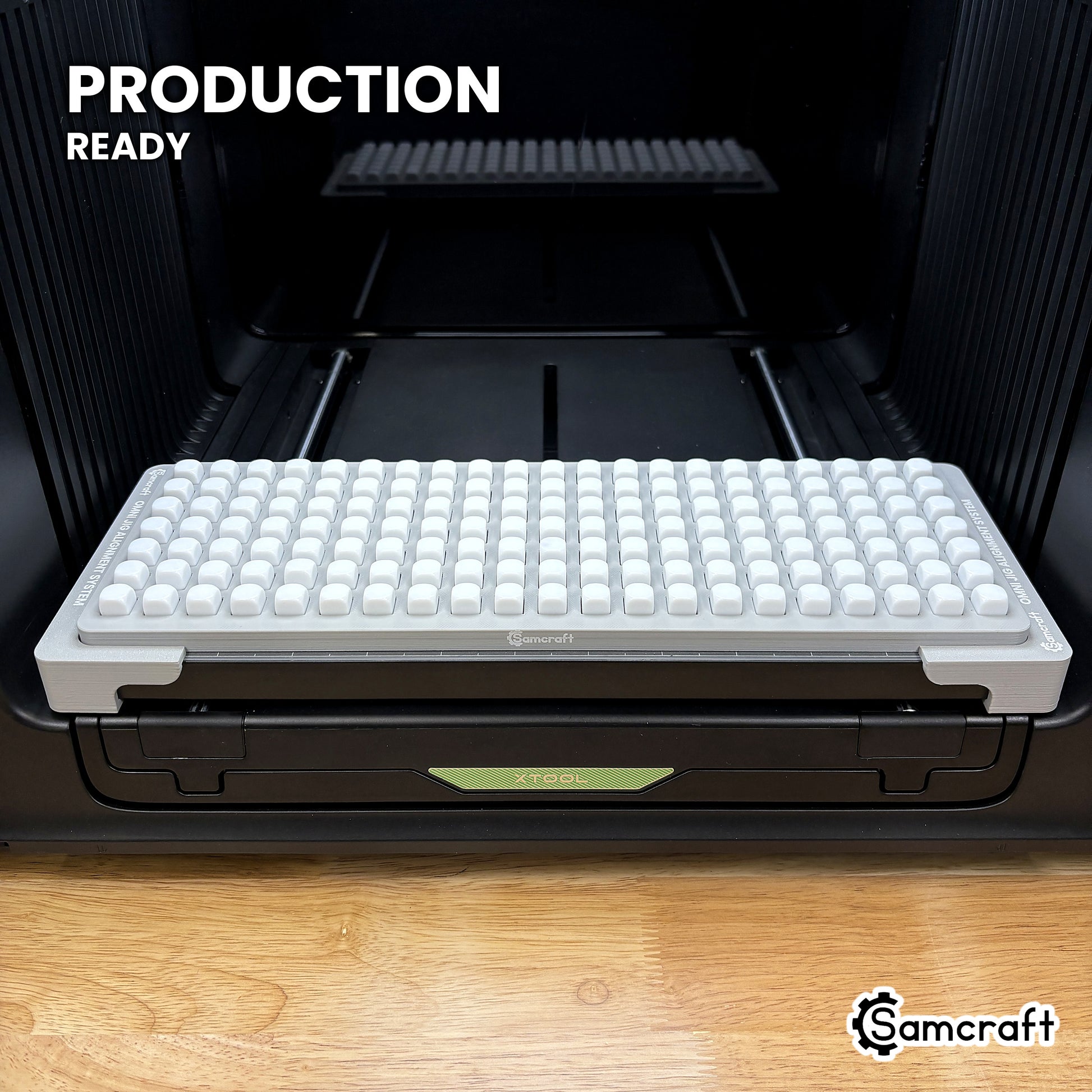 Samcraft 10mm dice jig holding 147 blank dice on the xTool Omni UV printer bed, set up for production runs.