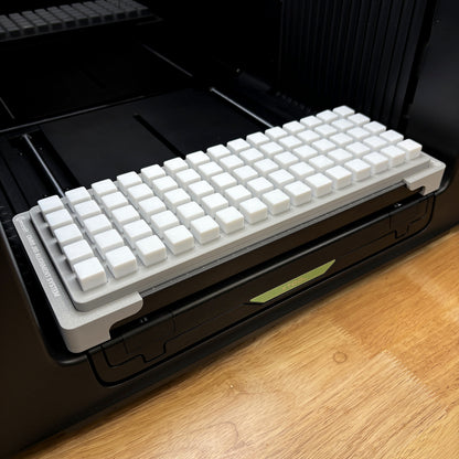 Samcraft 16mm dice jig on the bed of an xTool Omni UV printer, holding a full grid of 75 white blank D6 dice.
