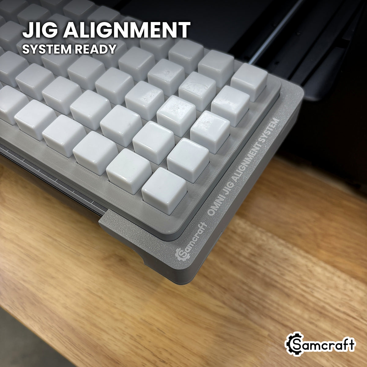 Close-up of the Samcraft 16mm dice jig seated on the Omni Jig Alignment System, the alignment system lettering visible along the edge.