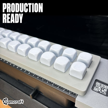 Samcraft 22mm Dice Jig loaded with two rows of white 22mm dice, ready to print
