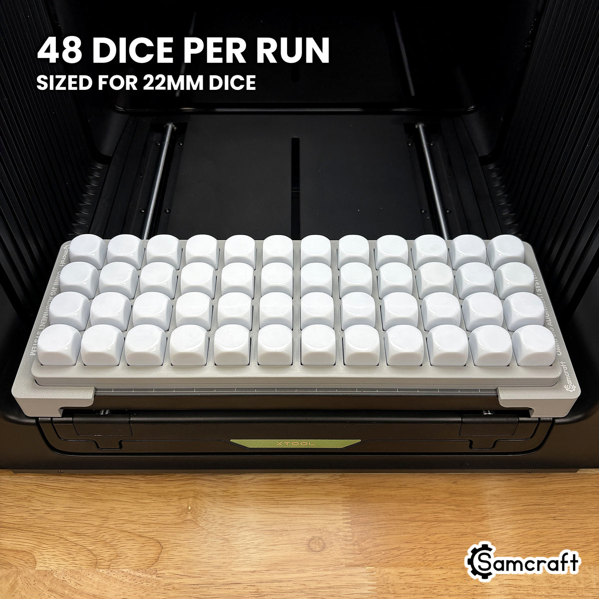 Samcraft 22mm dice jig loaded with 48 blank dice, a full production run in a single pass on the xTool Omni.