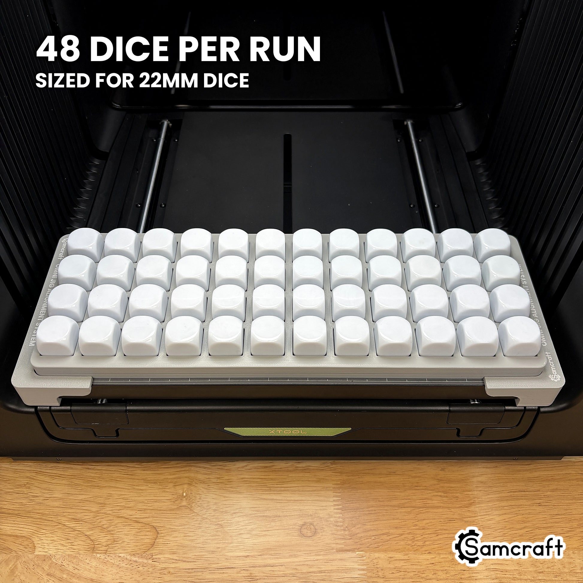 Samcraft 22mm dice jig loaded with 48 blank dice, a full production run in a single pass on the xTool Omni.