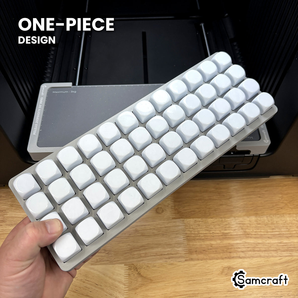 Hand holding the one-piece Samcraft 22mm dice jig for the xTool Omni, 48 blank dice seated in a single molded gray tray.