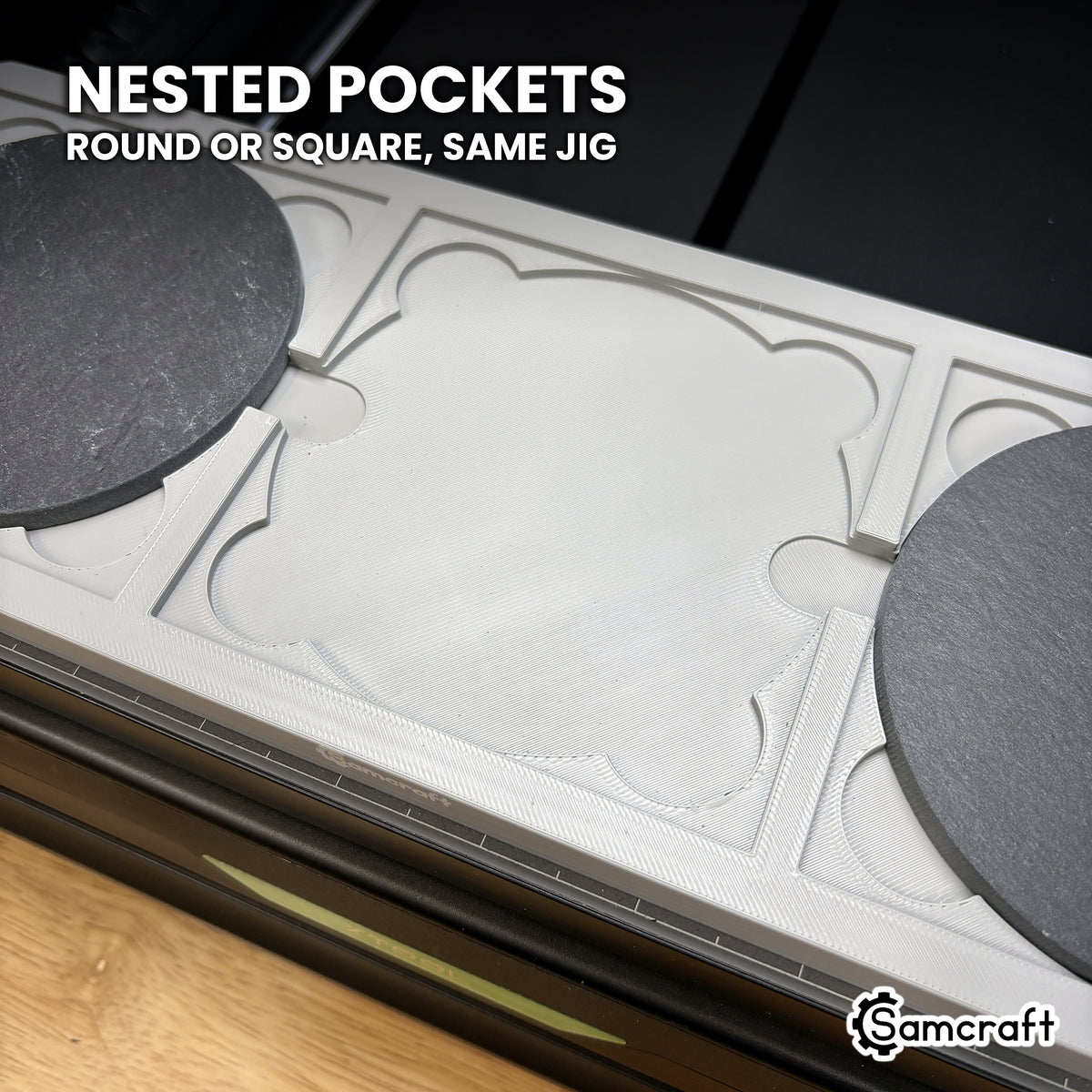 Empty nested pocket in the Samcraft xTool Omni coaster jig, showing the square step and the round recess below it.