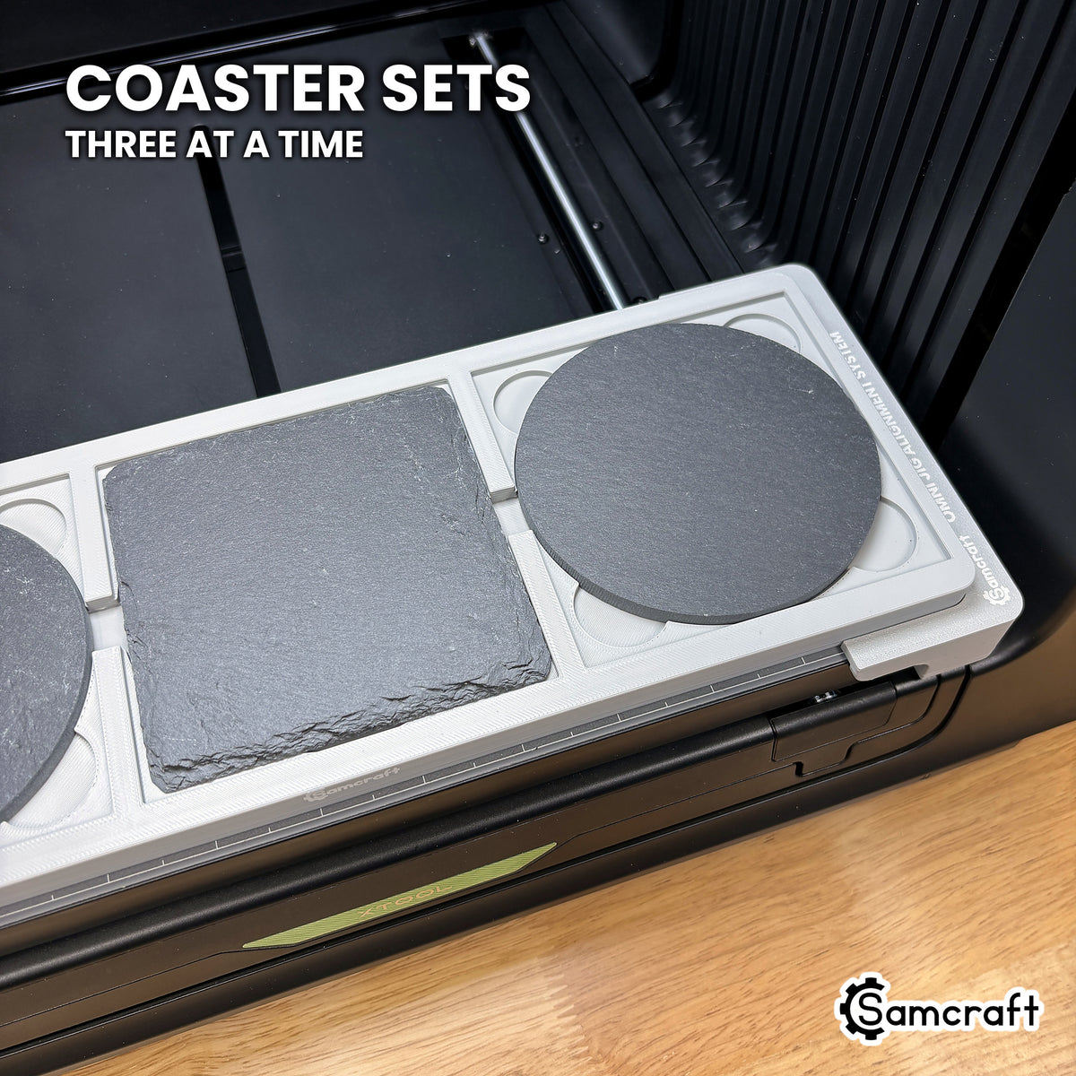 Samcraft xTool Omni 4 inch coaster jig filled with three slate coasters, ready to print a mixed round and square coaster set.
