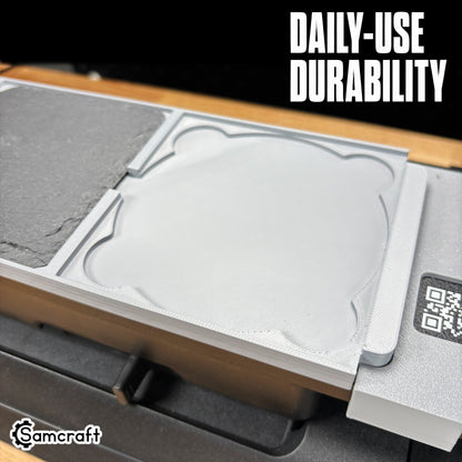 Close-up of the Samcraft 4-inch Drink Coaster Jig's durable gray tray with a recessed coaster pocket and built-in alignment ruler on the eufyMake E1.