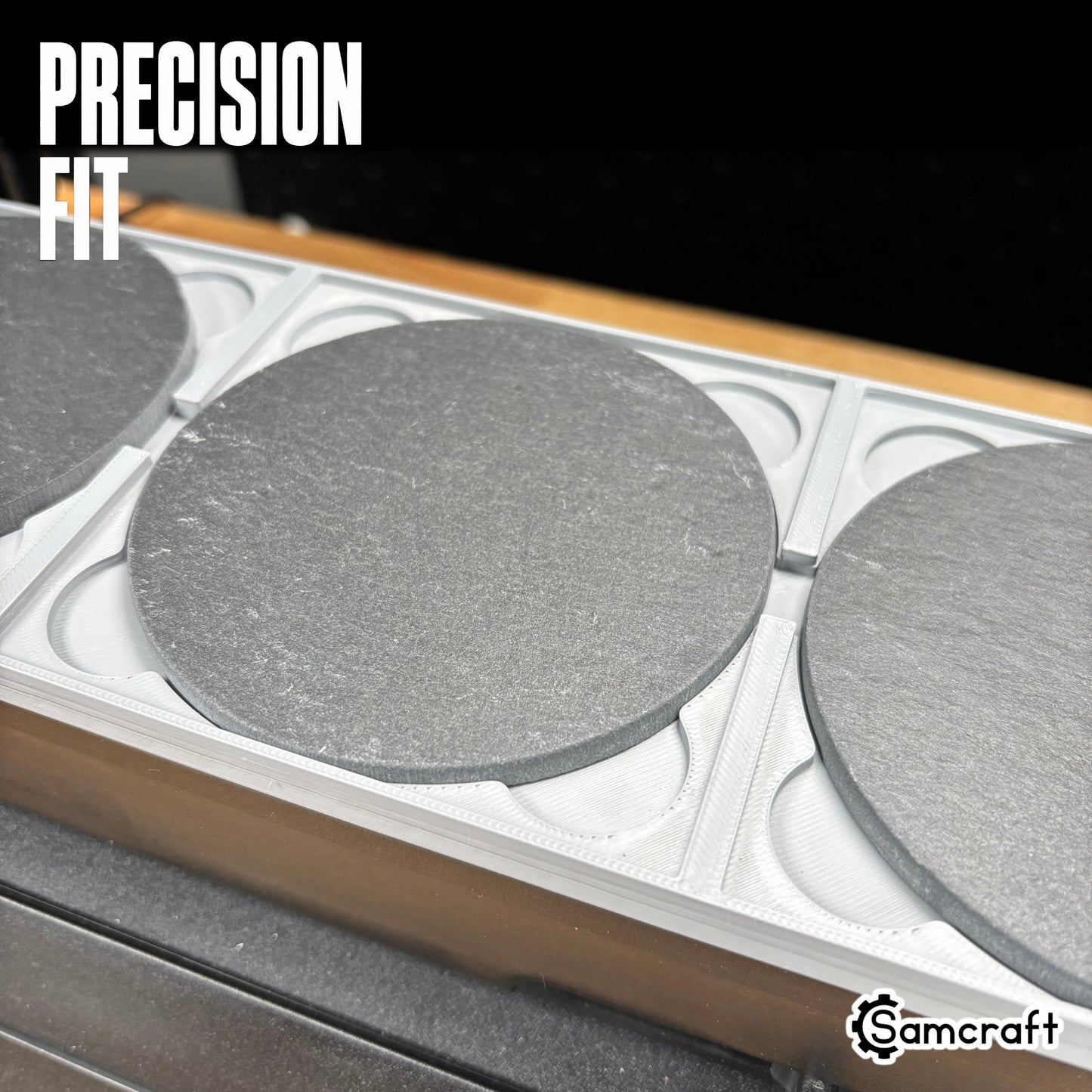 Precision-fit Samcraft 4-inch Drink Coaster Jig holding round slate coasters snugly in the gray tray's recessed pockets on the eufyMake E1.
