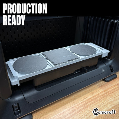 Production-ready Samcraft 4-inch Drink Coaster Jig holding round and square slate coasters in a gray tray on the eufyMake E1 UV printer bed.