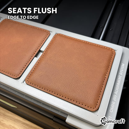Leatherette coaster seated flush in the Samcraft xTool Omni jig pocket, level with the surrounding surface.