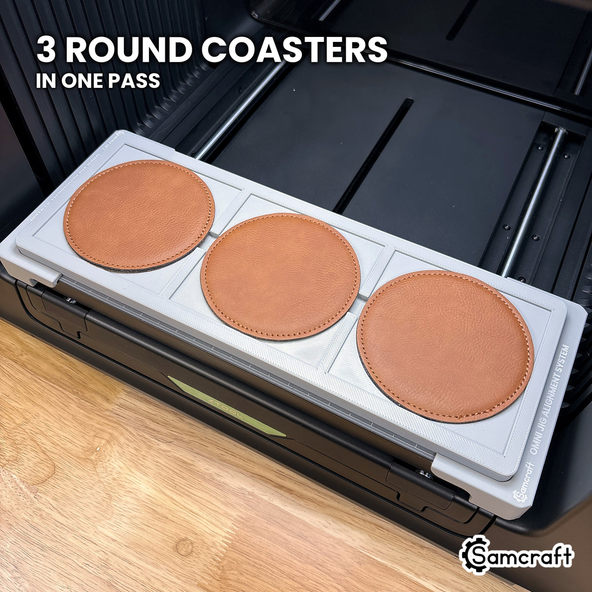 Three round 99mm coasters loaded in the Samcraft xTool Omni jig, three round coasters printed at a time.