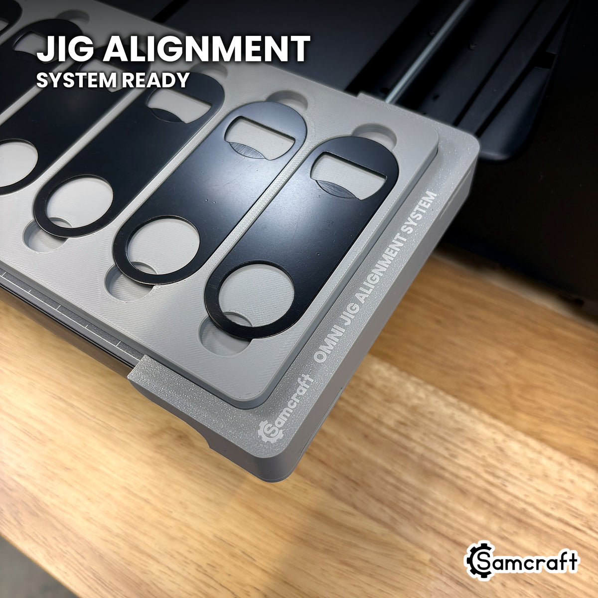 Samcraft opener jig seated on the optional Samcraft Omni Jig Alignment System, the alignment system lettering visible along the edge.