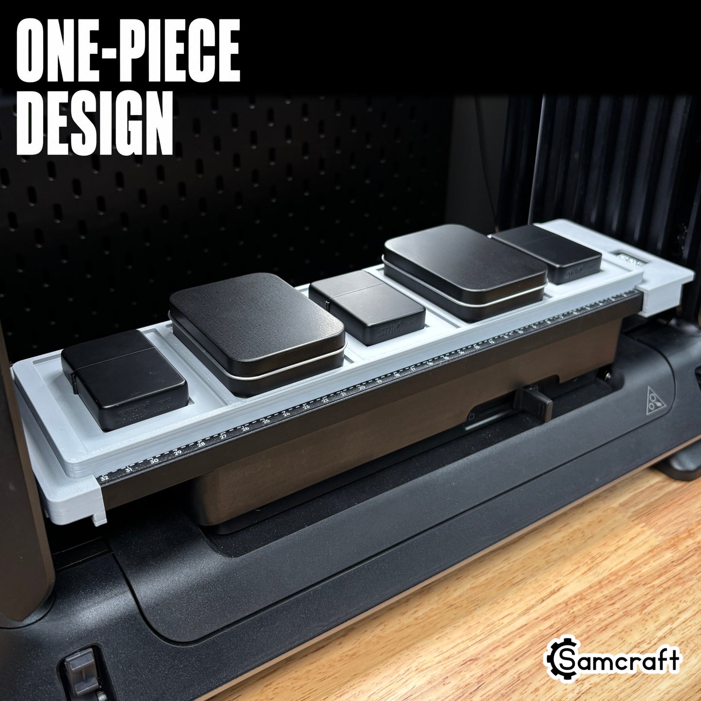 Samcraft Flip Top Lighter Jig holding five matte black flip-top lighters in a one-piece gray 3D-printed tray with built-in alignment ruler on the eufyMake E1 UV printer.