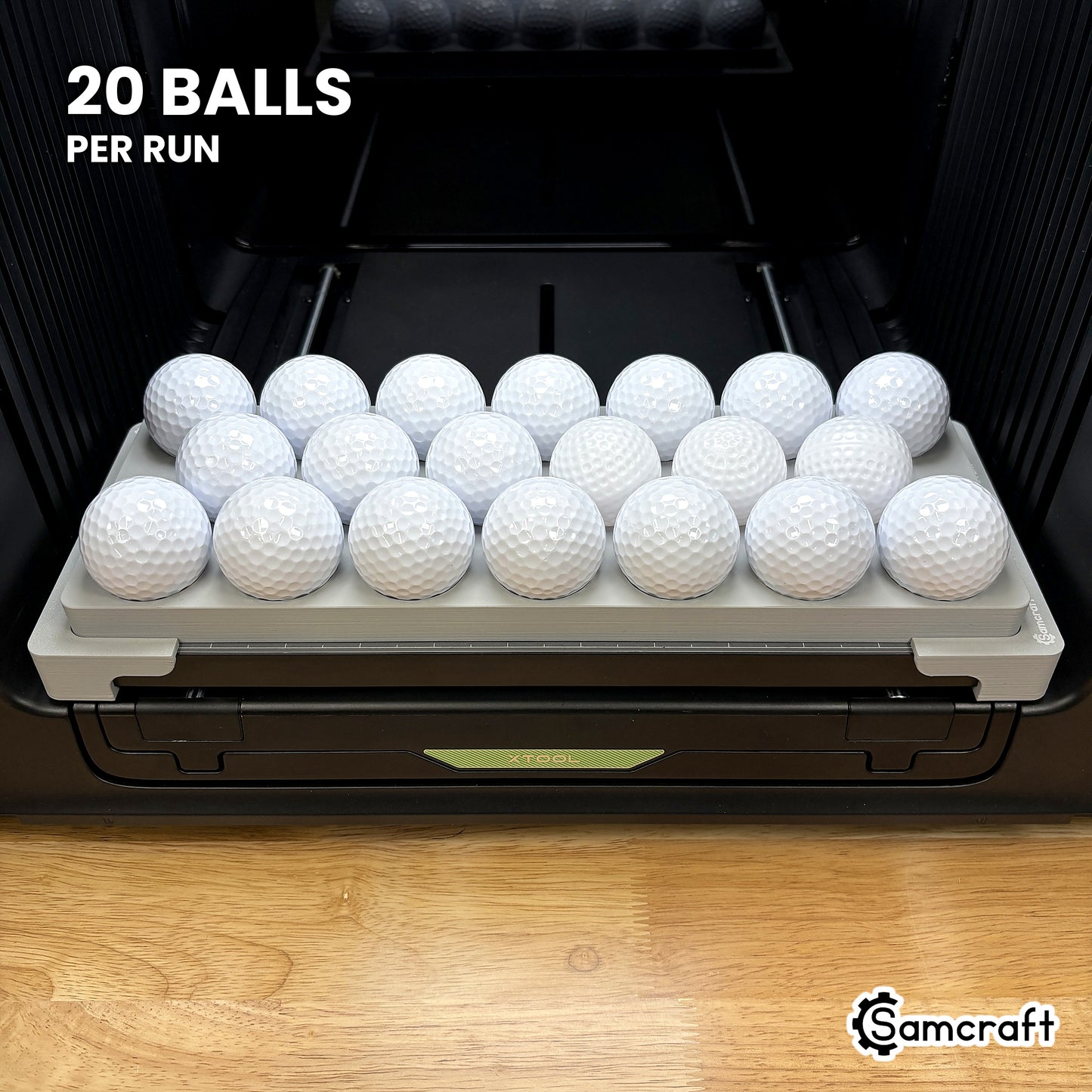 Samcraft golf ball jig for the xTool Omni loaded with twenty white golf balls, a full run in a single pass.