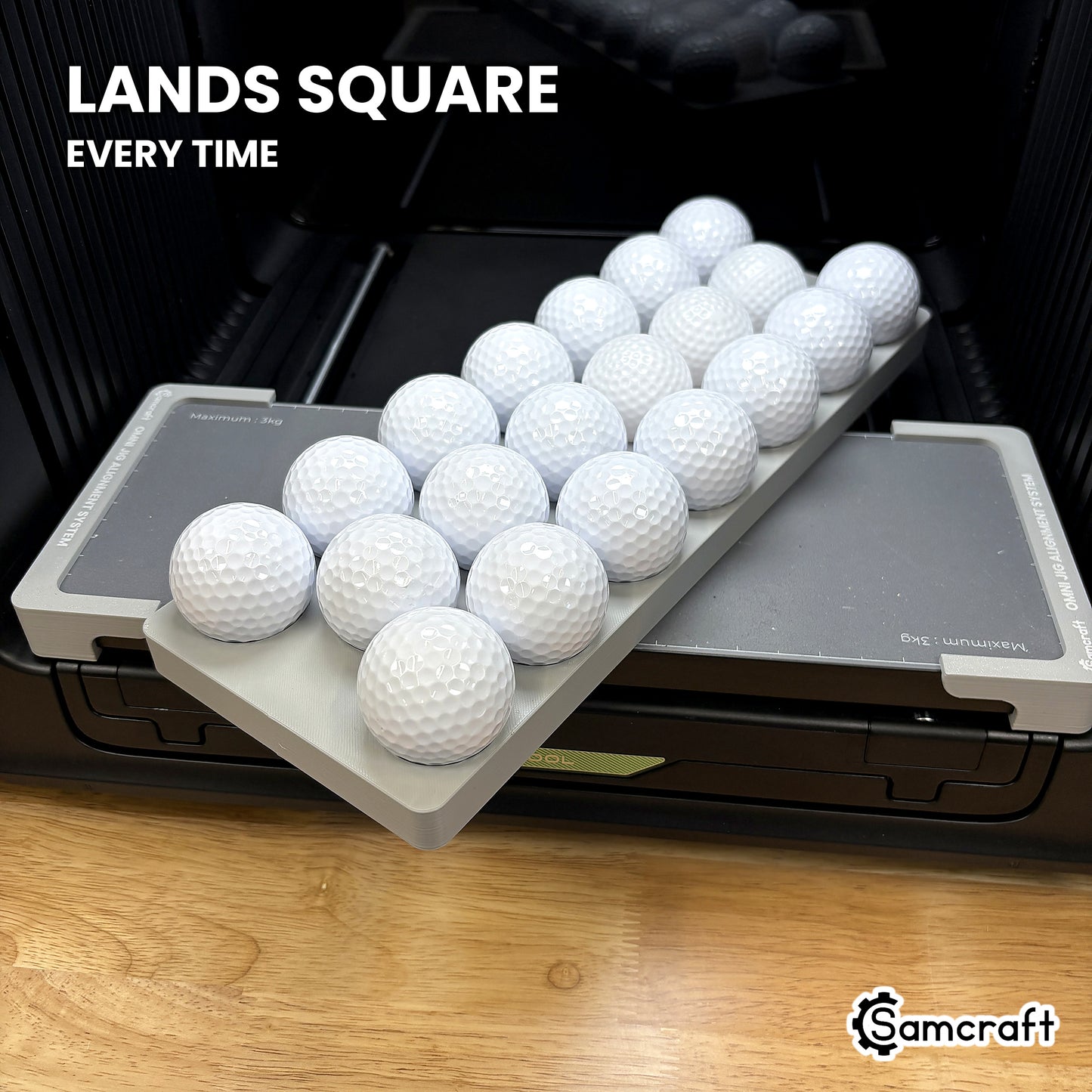 Samcraft golf ball jig dropping into the Omni Jig Alignment System so it lands square and centered on every swap.
