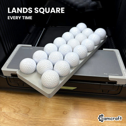 Samcraft golf ball jig dropping into the Omni Jig Alignment System so it lands square and centered on every swap.