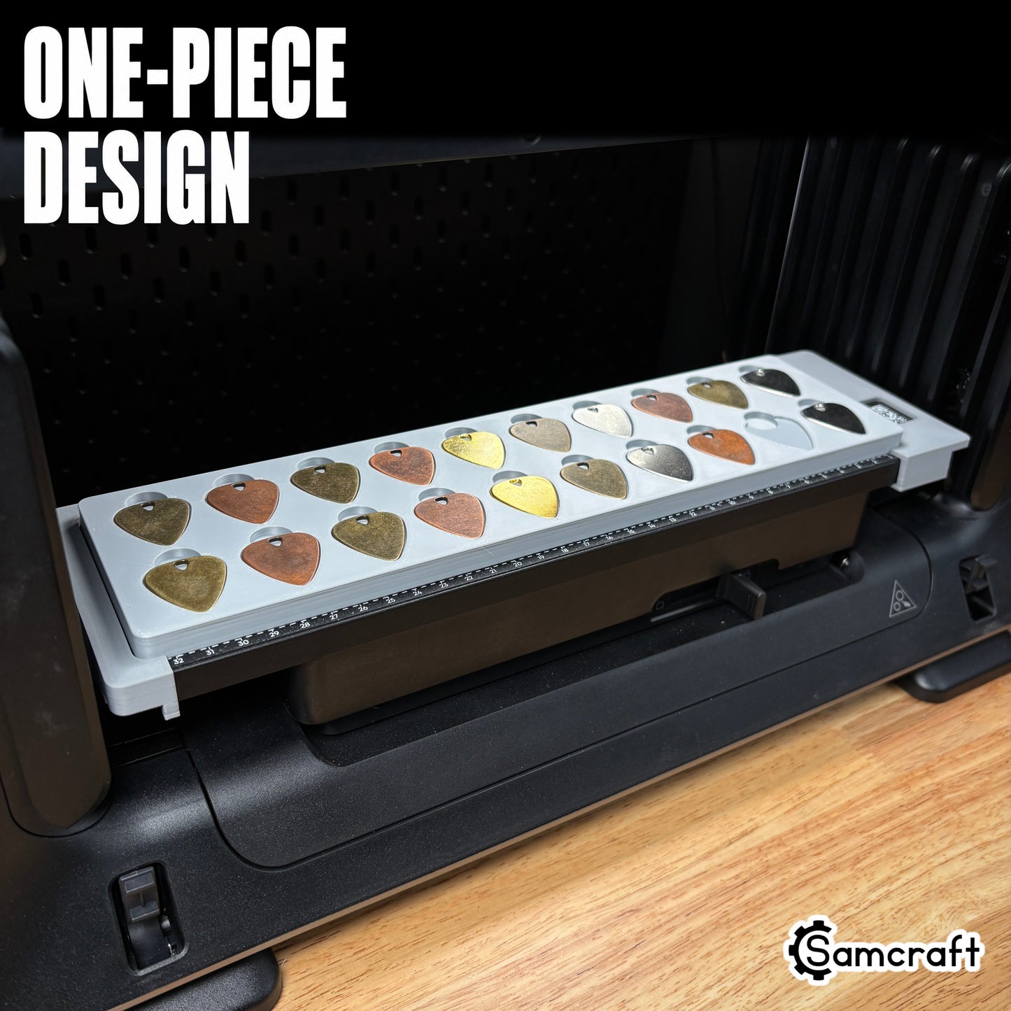 guitar-pick-jig-eufymake-one-piece-design.jpg

Guitar Pick Jig for the eufyMake E1 — full view of the gray one-piece 3D-printed tray mounted on the printer, two rows of metal guitar picks in brass, copper, and silver finishes in their molded pockets, with the built-in measurement ruler, showing the solid single-piece design.