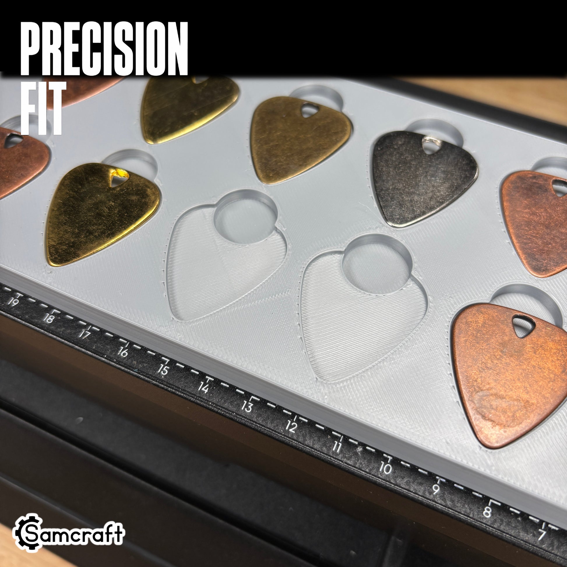 guitar-pick-jig-eufymake-precision-fit.jpg

Guitar Pick Jig for the eufyMake E1 — close-up of metal guitar picks in brass, copper, and gunmetal finishes seated flush in the recessed pockets of the gray 3D-printed tray, with empty pockets and the built-in ruler visible, showing the precision fit.