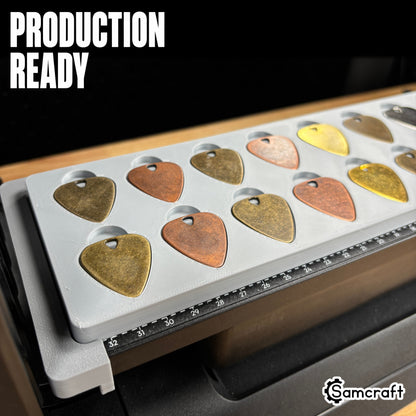 guitar-pick-jig-eufymake-production-ready.jpg

Guitar Pick Jig for the eufyMake E1 — angled view of metal guitar picks in antique brass and copper finishes lined up in two rows in the gray 3D-printed tray with built-in ruler, set up for production-ready batch printing.