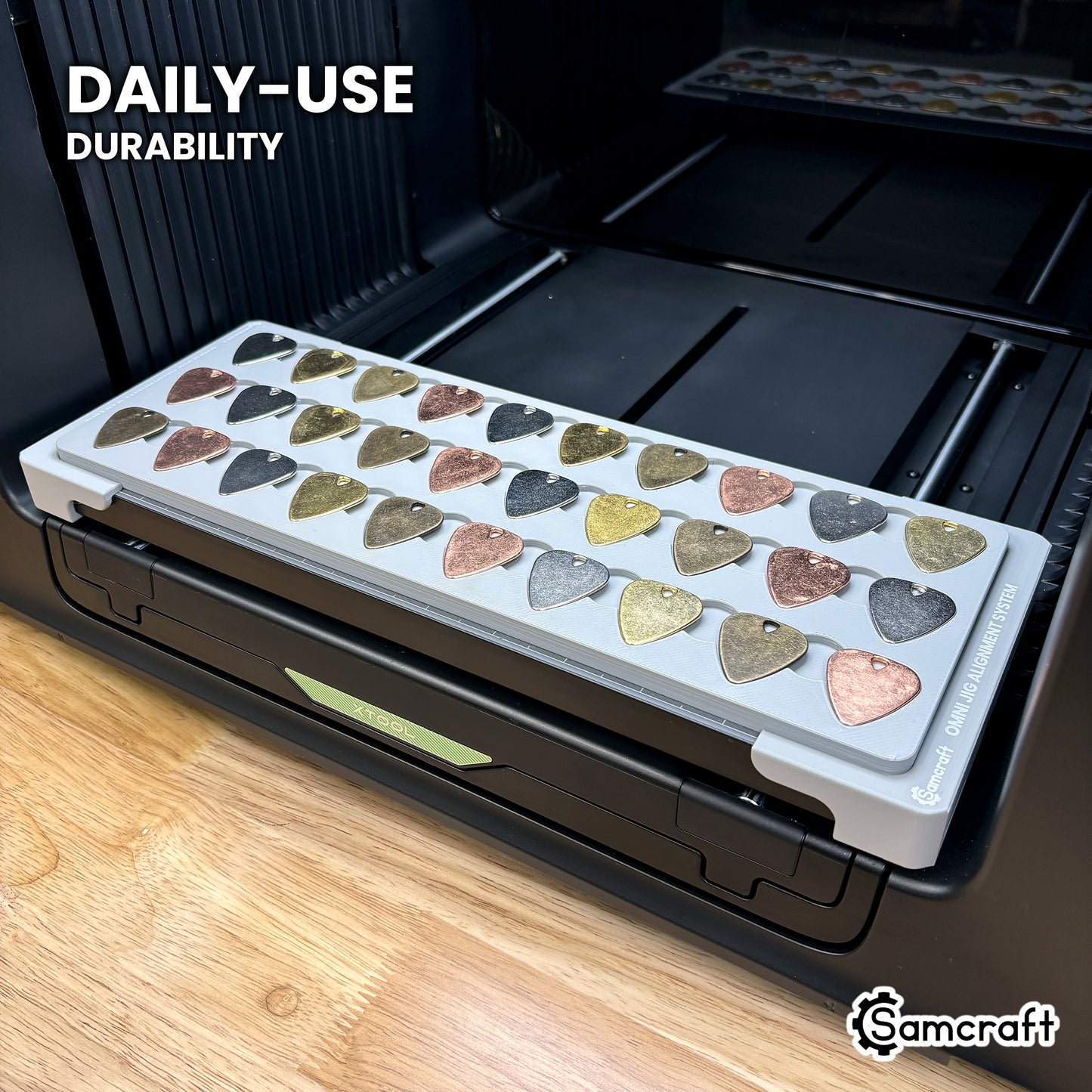 Samcraft xTool Omni guitar pick jig held in hand, showing the durable one-piece construction built for daily use.