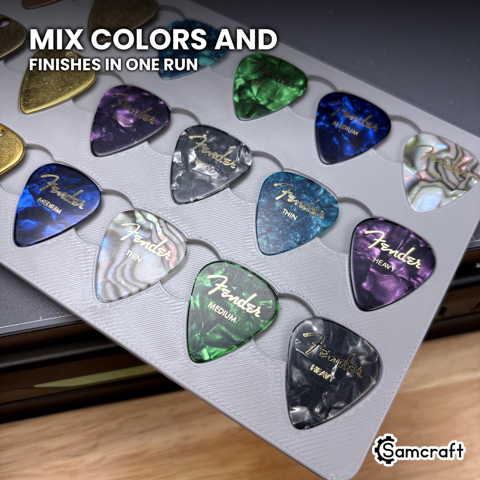 Mixed pick finishes printed together in the Samcraft xTool Omni guitar pick jig in a single run.