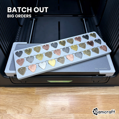 Samcraft xTool Omni guitar pick jig filled with printed picks, ready for band, merch and gift batch orders.