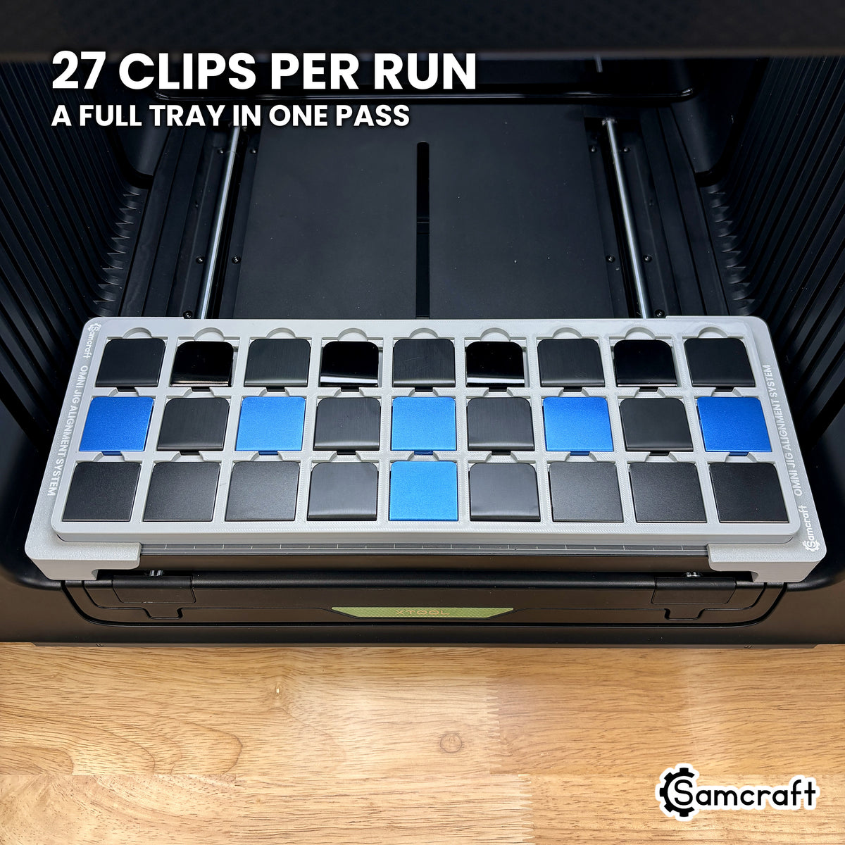 Samcraft hat clip jig for the xTool Omni loaded with twenty-seven hat brim clips, a full tray printed in one pass.