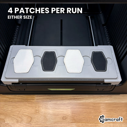 Samcraft hex patch jig for the xTool Omni loaded with four hexagon leatherette patches, a full set printed in one job.