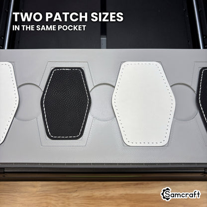 Two sizes of hexagon leatherette patch shown side by side in the Samcraft xTool Omni jig, both seated from the same nested pocket.