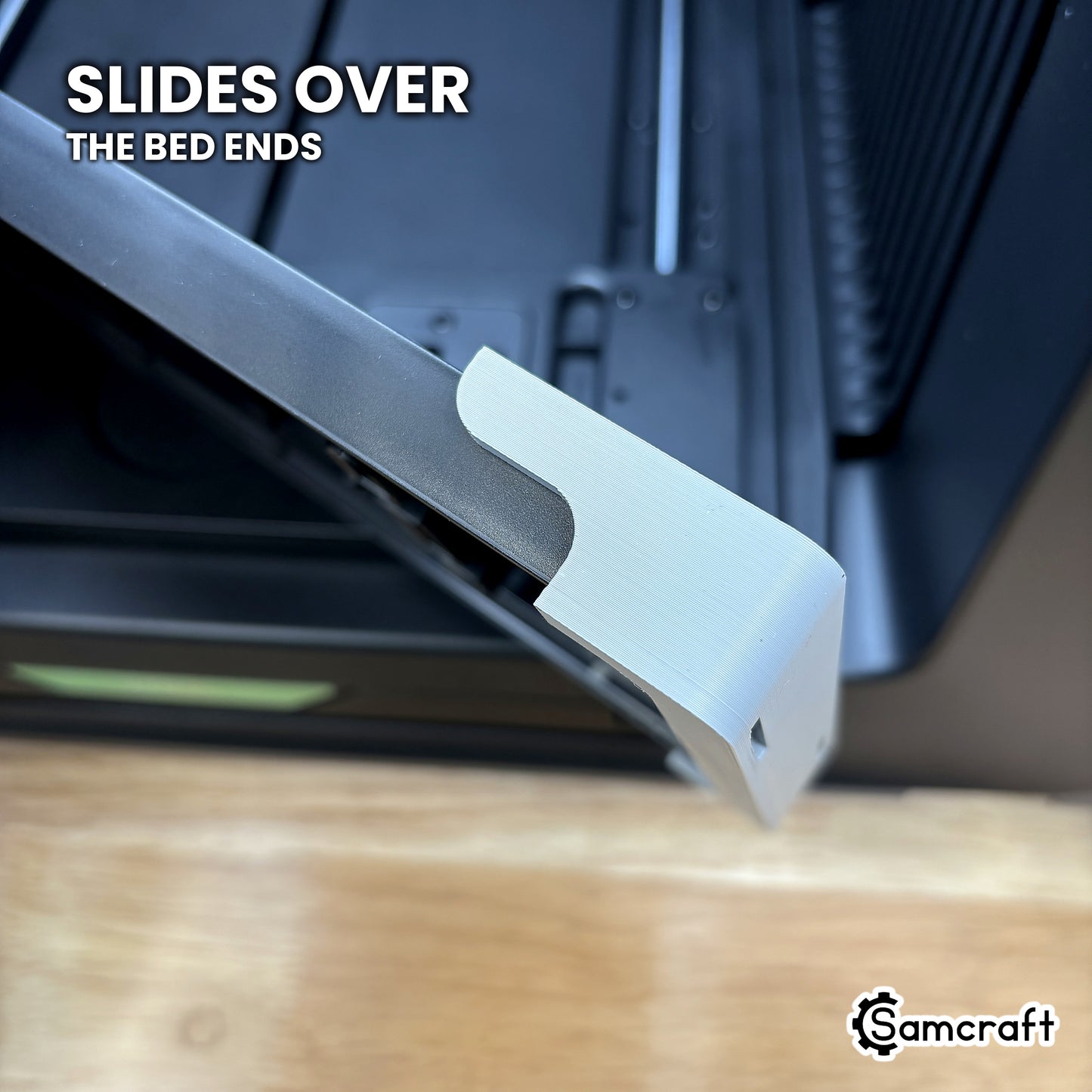 The Samcraft Omni Jig Alignment System sliding over the ends of the xTool Omni bed.