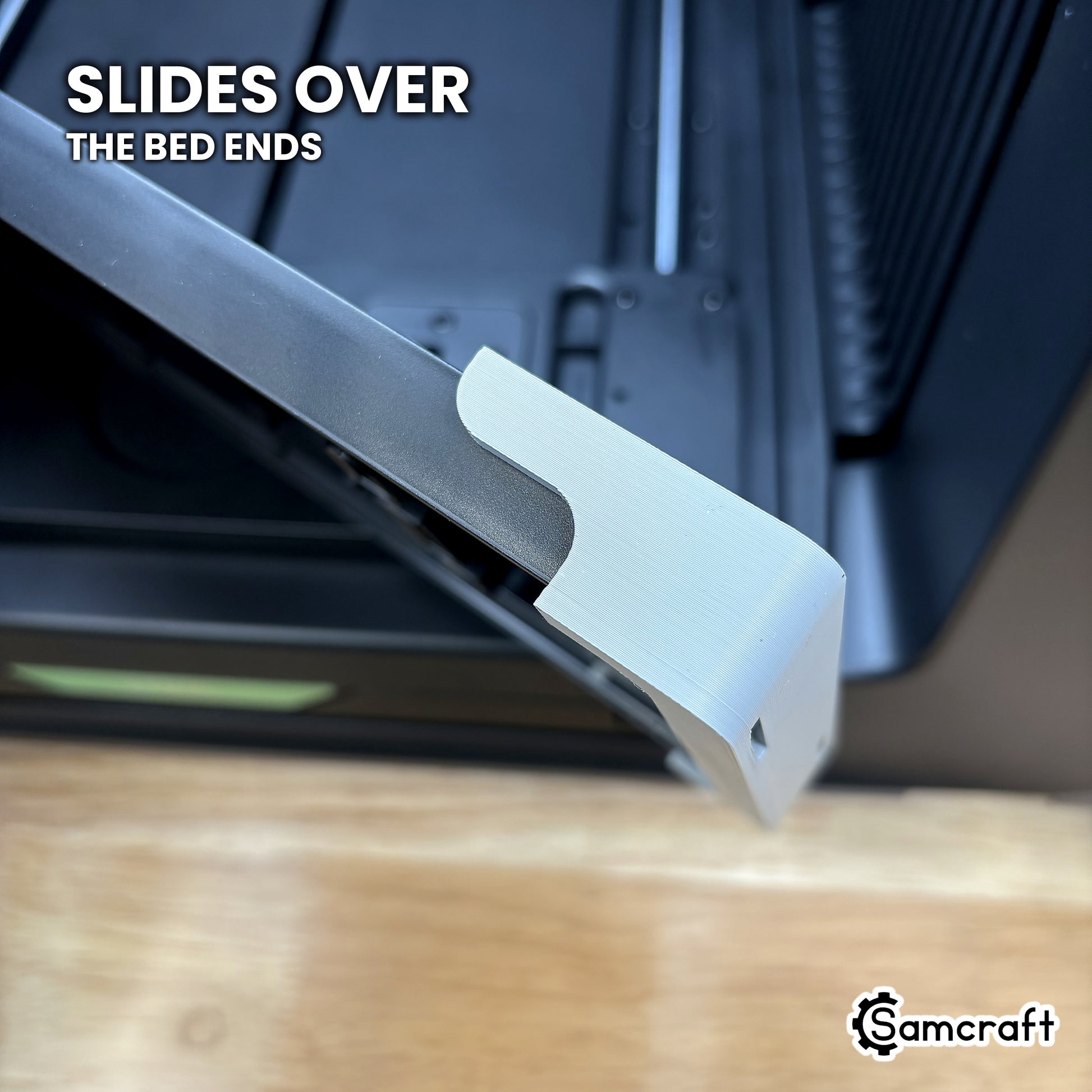 The Samcraft Omni Jig Alignment System sliding over the ends of the xTool Omni bed.