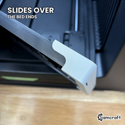 The Samcraft Omni Jig Alignment System sliding over the ends of the xTool Omni bed.