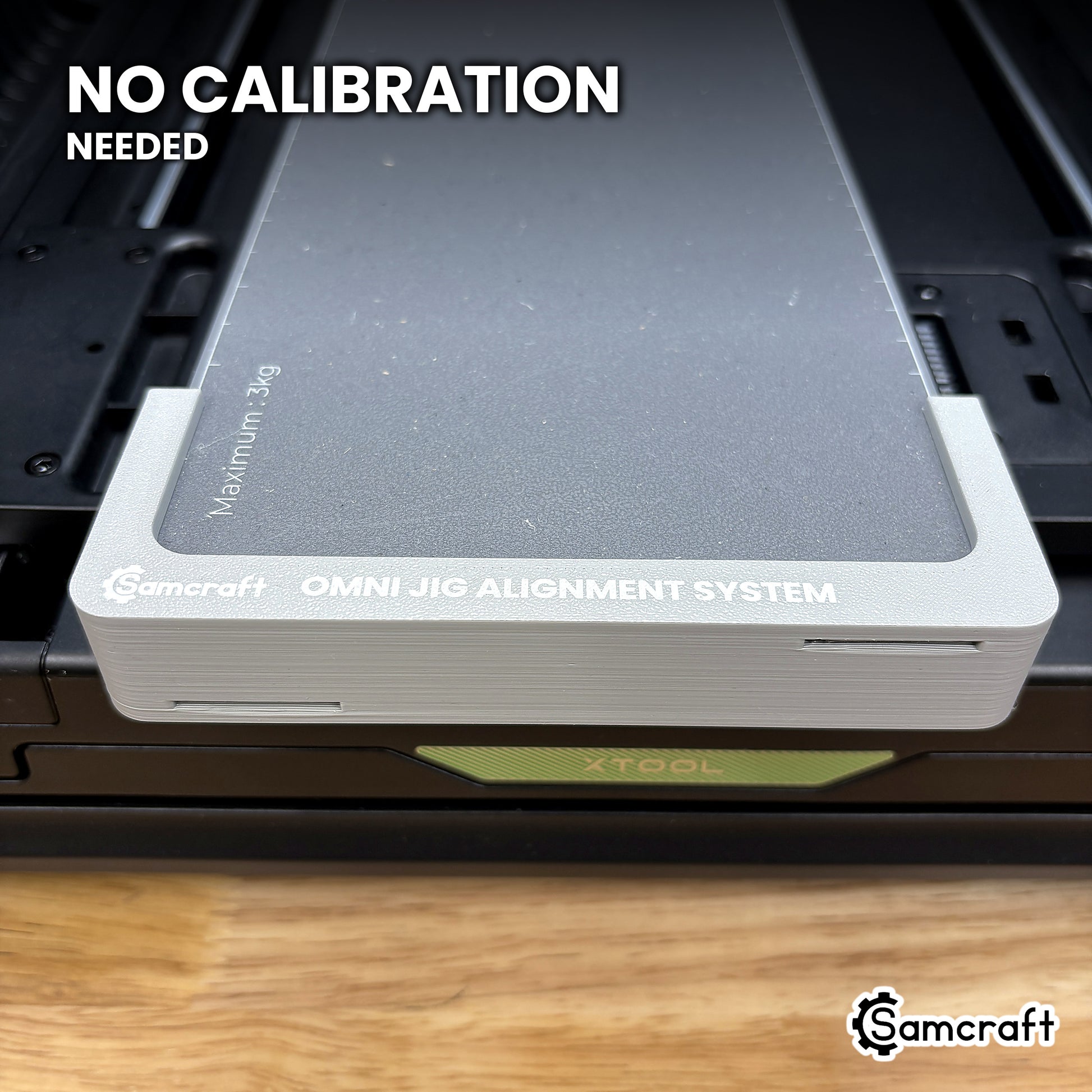 The Samcraft Omni Jig Alignment System installed on the xTool Omni bed, needing no calibration because the Omni scanner and xTool Studio handle alignment.