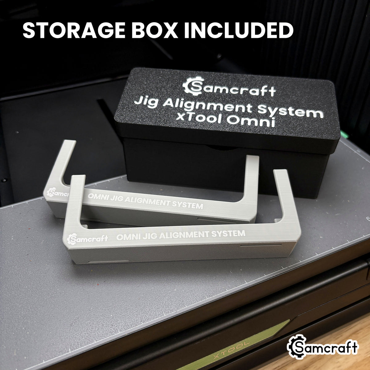 Both Samcraft Omni Jig Alignment System pieces laid out in front of the printed storage box they ship in, its lid labeled Samcraft Jig Alignment System xTool Omni.