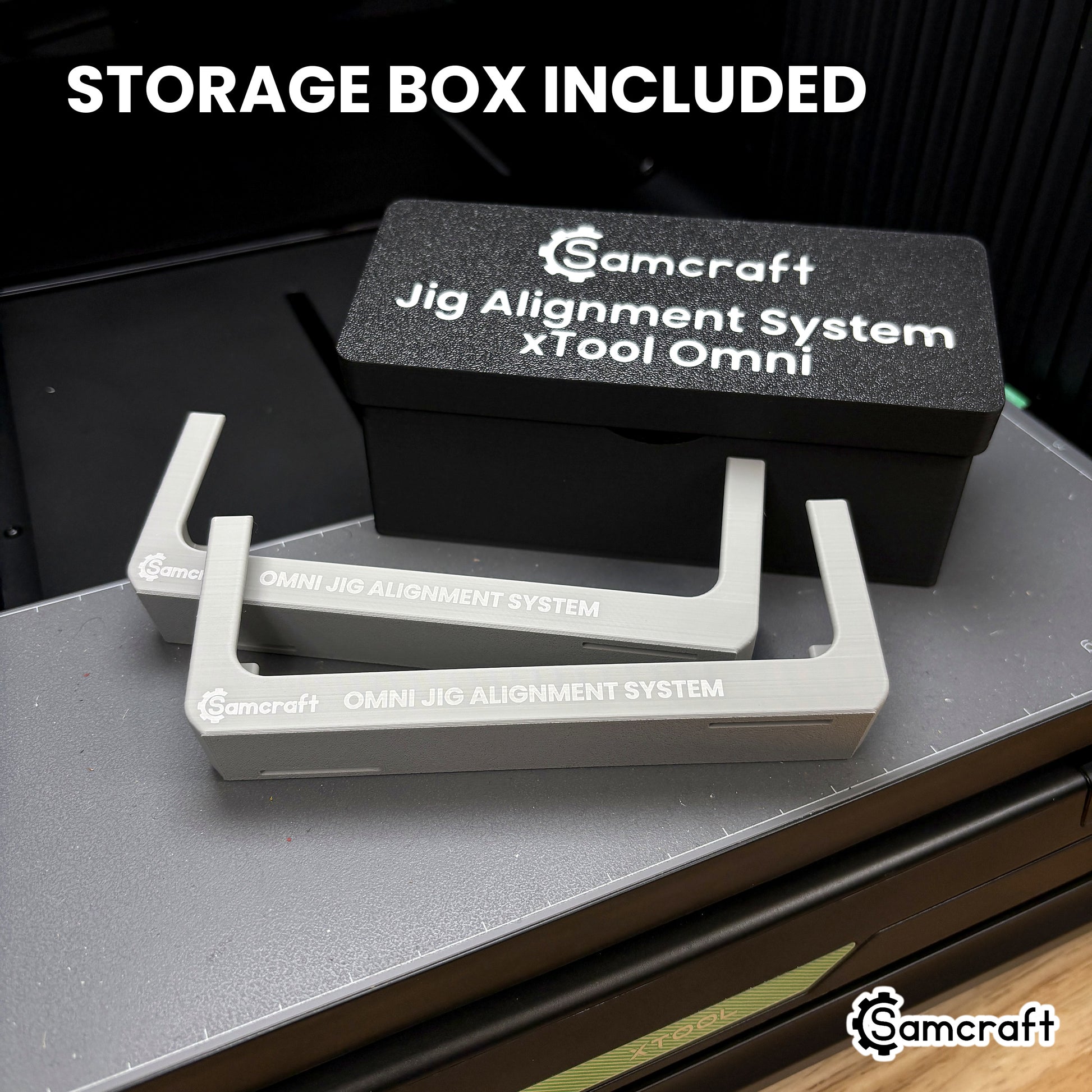 Both Samcraft Omni Jig Alignment System pieces laid out in front of the printed storage box they ship in, its lid labeled Samcraft Jig Alignment System xTool Omni.