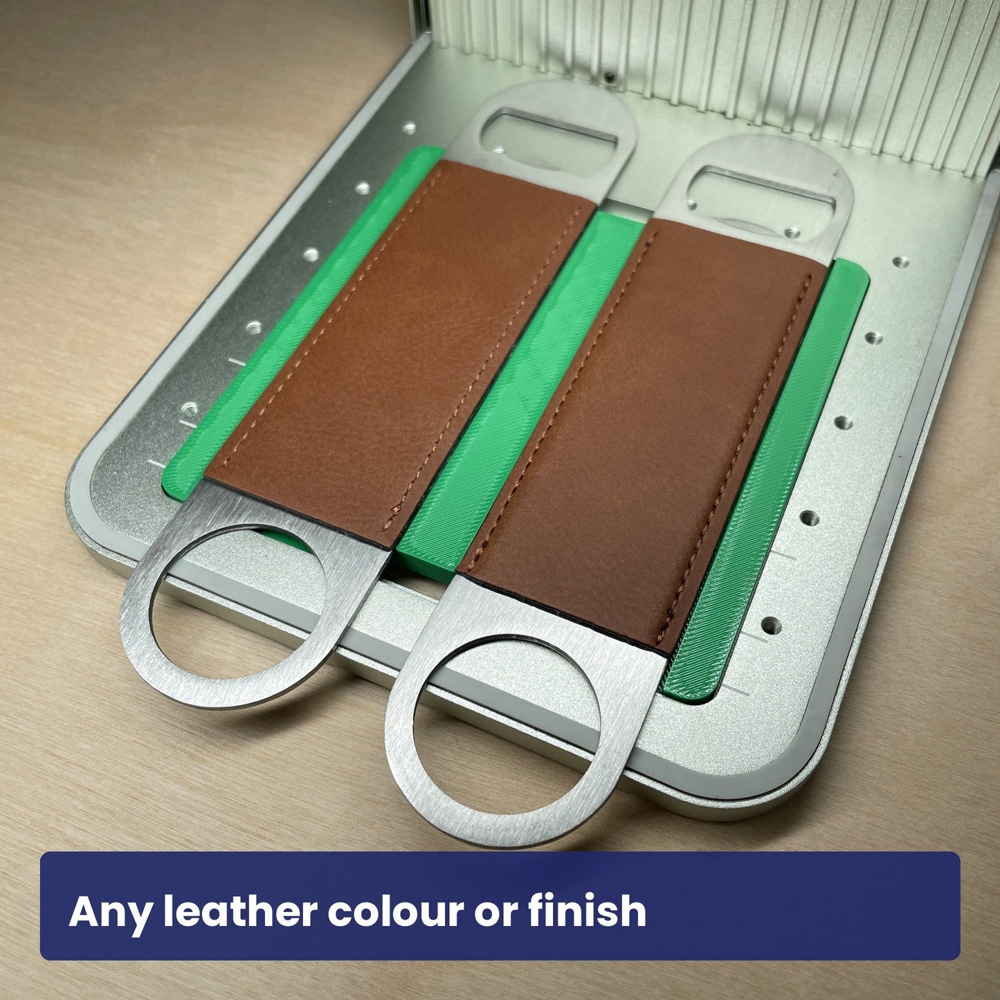 Samcraft large bottle opener jig holding two brown leather bottle openers.