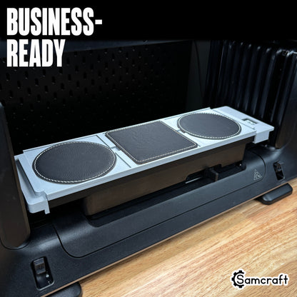 Business-ready Samcraft Leather/Silicone Drink Coaster Jig holding round and square black leather coasters in a gray tray with built-in ruler on the eufyMake E1 UV printer.