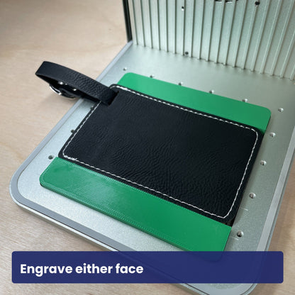 Samcraft luggage tag jig holding the tag turned over to show the plain leatherette face.