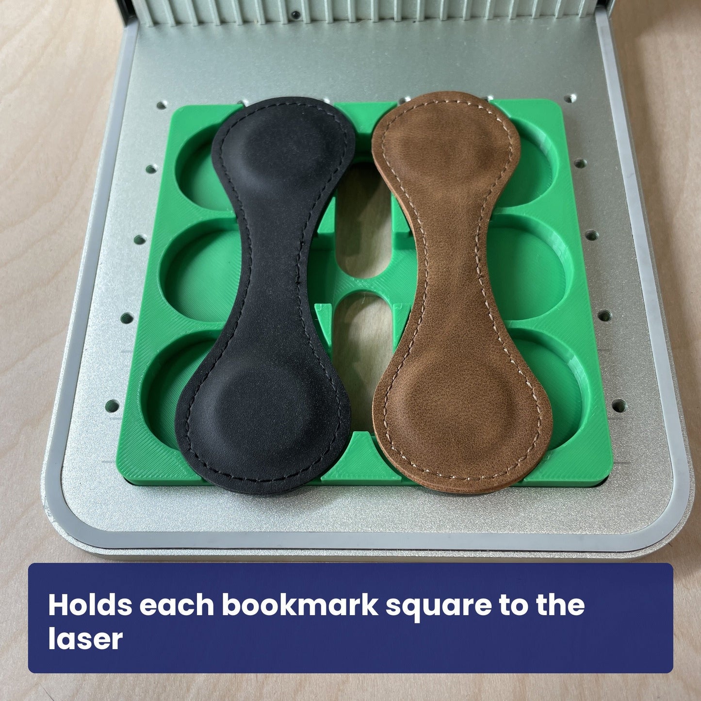Leather bookmark held square in the Samcraft jig, ready to engrave.