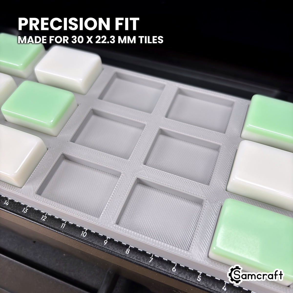 Close-up of the Samcraft eufyMake E1 mahjong tile jig with several pockets empty, showing the square-cornered tile pockets.